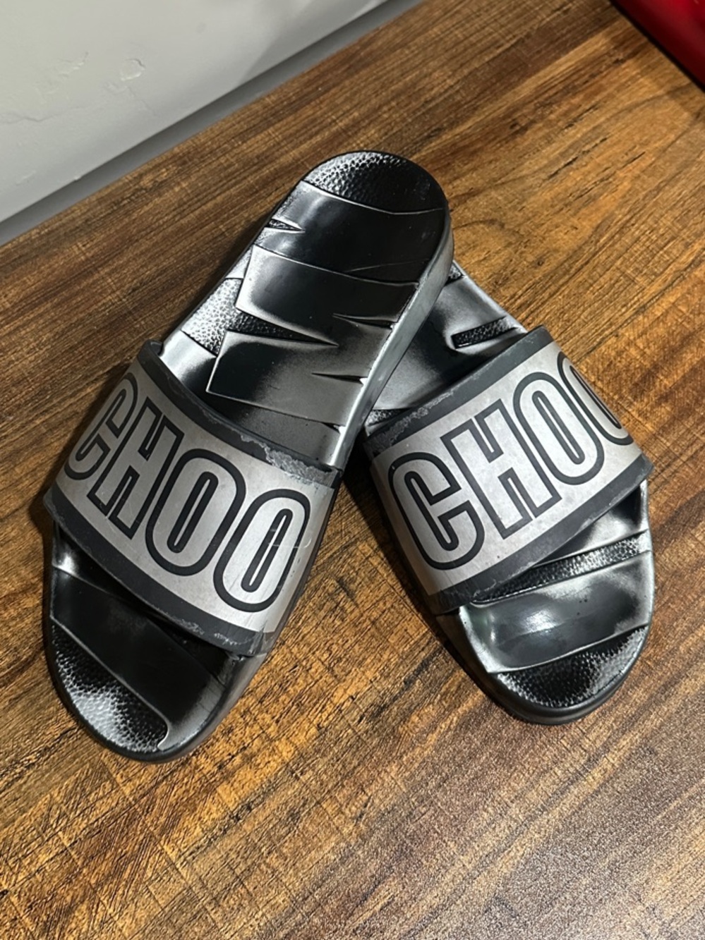 Jimmy Choo Black and Silver Rubber Slides